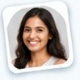 Patient Priya smiling after root canal treatment